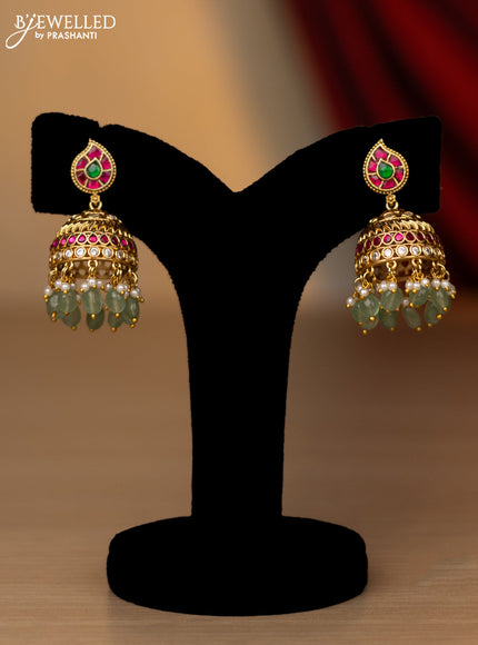 Jadau necklace lakshmi kasu design with jadau kundan stones and pearl & mint green beads hanging