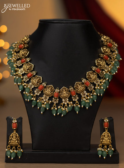 Antique necklace lakshmi design with kemp & cz stones and pearl & mint green beads hanging