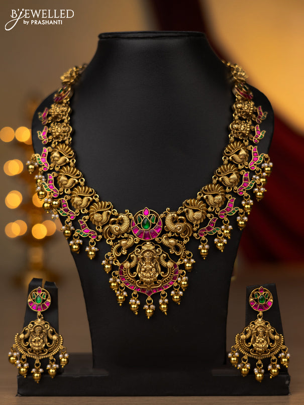 Antique necklace lakshmi & peacock design with jadau stones and pearl & golden beads hanging
