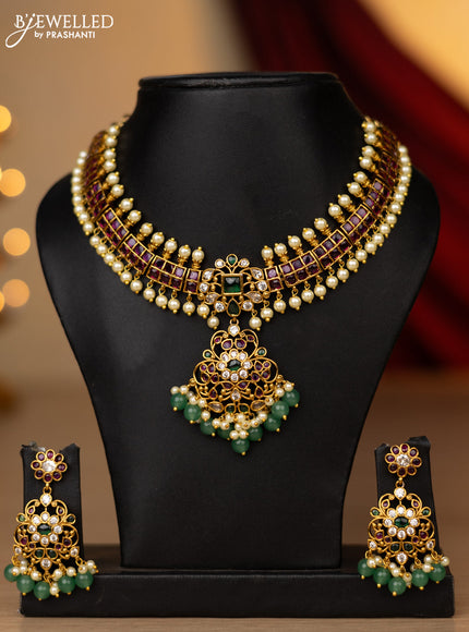 Antique necklace with kemp & cz stones and pearl & green beads hanging