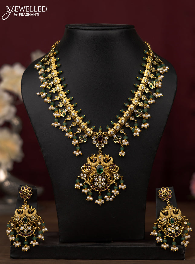 Antique guttapusalu Necklace double peacock design with kemp,cz stones and pearl and beads hangings