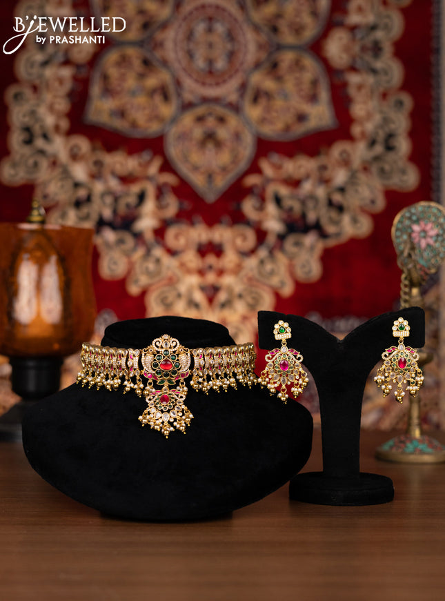 Jadau Choker peacock design with jadau kundan ,emerald and cz stones and gold beads and pearl hangings
