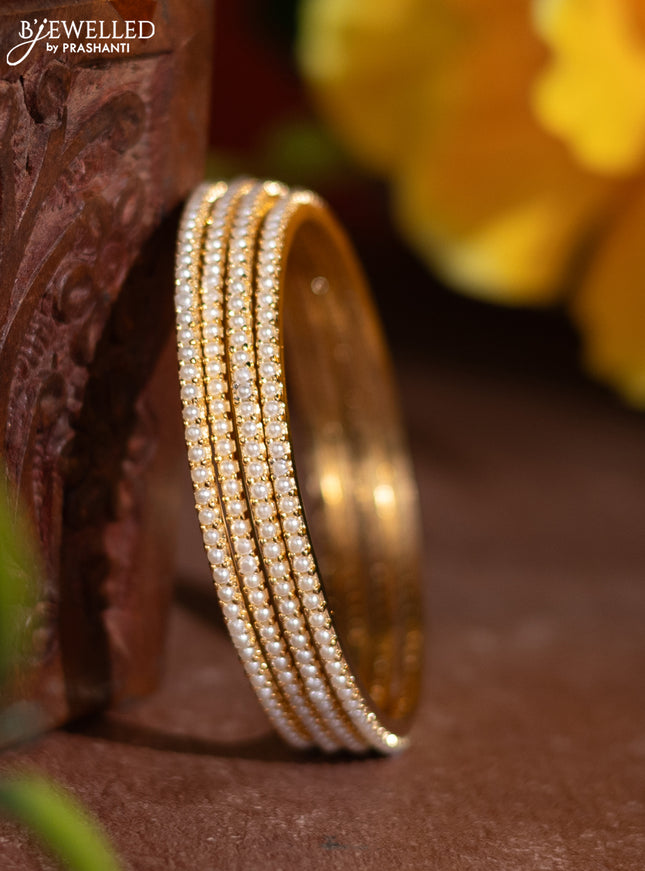 Pearl rajawadi bangle with pearls in gold finish