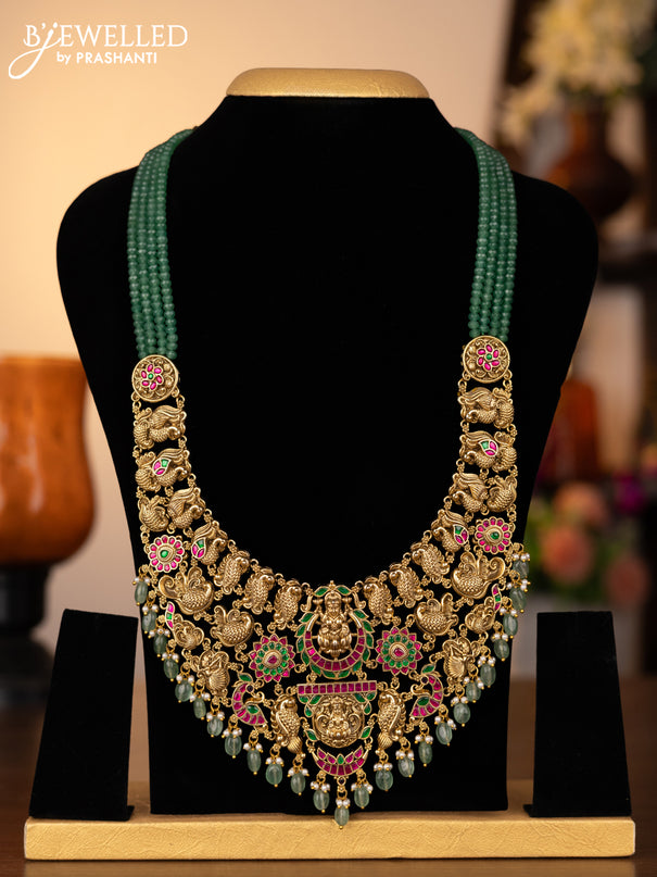 Antique green beaded haram lakshmi design with jadau kundan stones and natural beads hangings