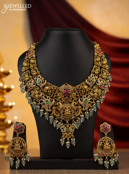 Jadau necklace lakshmi design with jadau kundan and cz stones with natural beads hanging