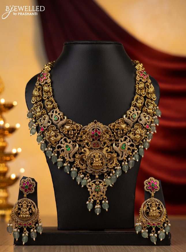 Jadau necklace lakshmi design with jadau kundan and cz stones with natural beads hanging