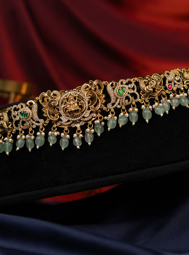 Antique jadau hip chain lakshmi design with jadau kundan stones with natural beads hanging