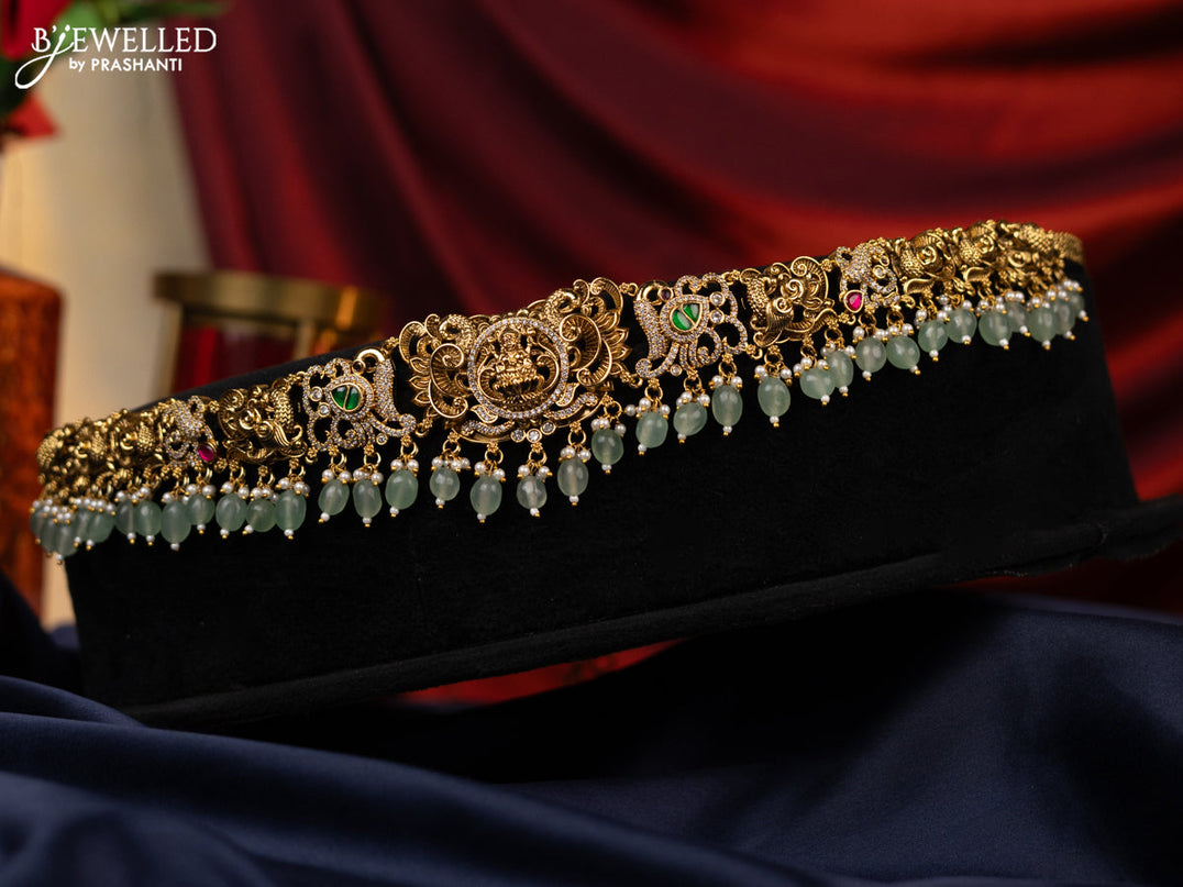 Antique jadau hip chain lakshmi design with jadau kundan stones with natural beads hanging