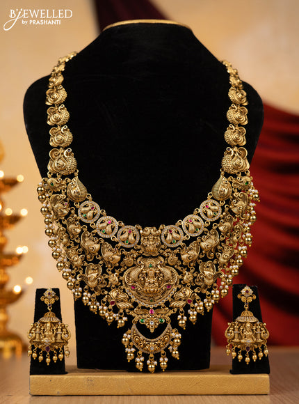 Jadau haaram lakshmi design with jadau kundan and cz stones with gold beads hanging