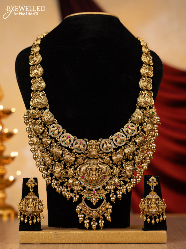 Jadau haaram lakshmi design with jadau kundan and cz stones with gold beads hanging