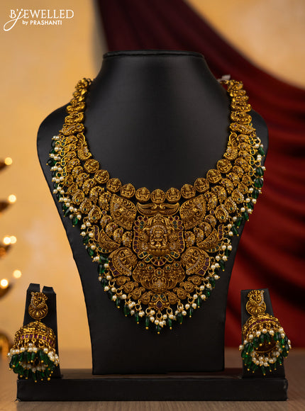 Antique necklace lakshmi design with kemp,cz stone and green pearl beads hanging