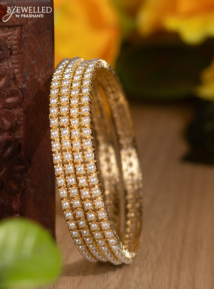 Pearl rajawadi bangles with pearls in gold finish