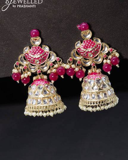 Fashion dangler pink jhumkas with kundan stones and pearl hanging
