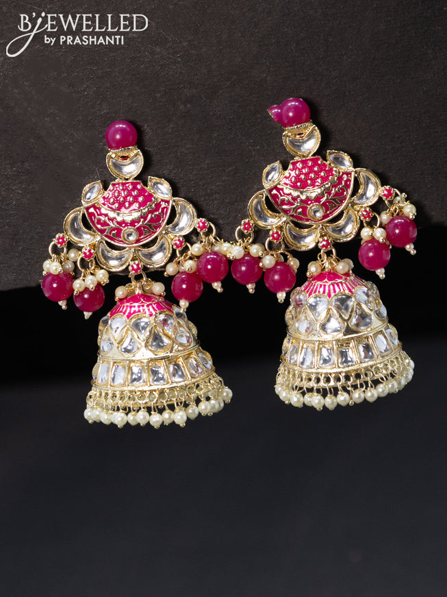 Fashion dangler pink jhumkas with kundan stones and pearl hanging
