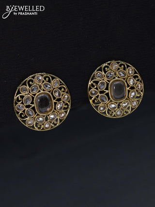 Fashion dangler floral design earrings with white stone