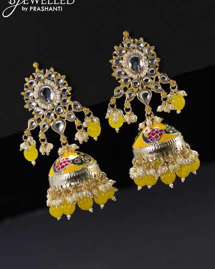 Fashion dangler yellow jhumka with kundan stones and pearl hangings