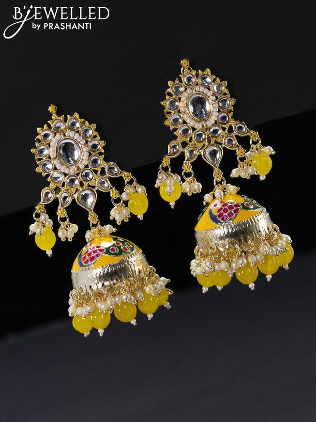 Fashion dangler yellow jhumka with kundan stones and pearl hangings