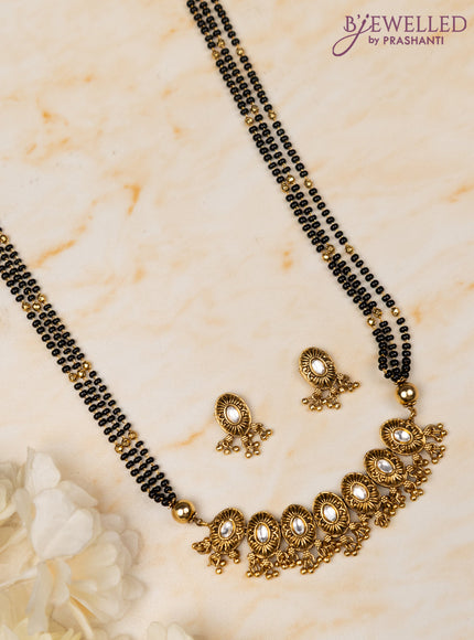 Mangalsutra triple layer with kundan stones and golden beads hangings