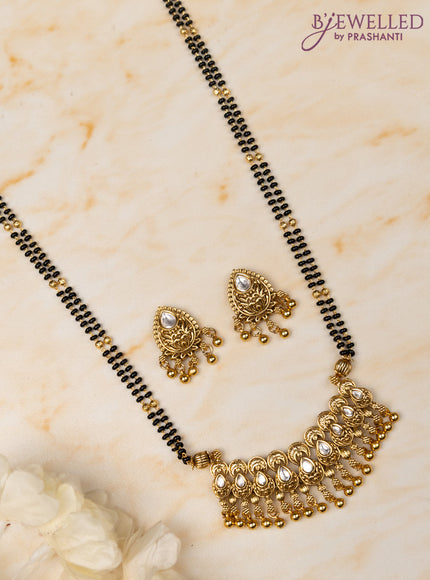 Mangalsutra double layer with kundan stones and golden beads hangings