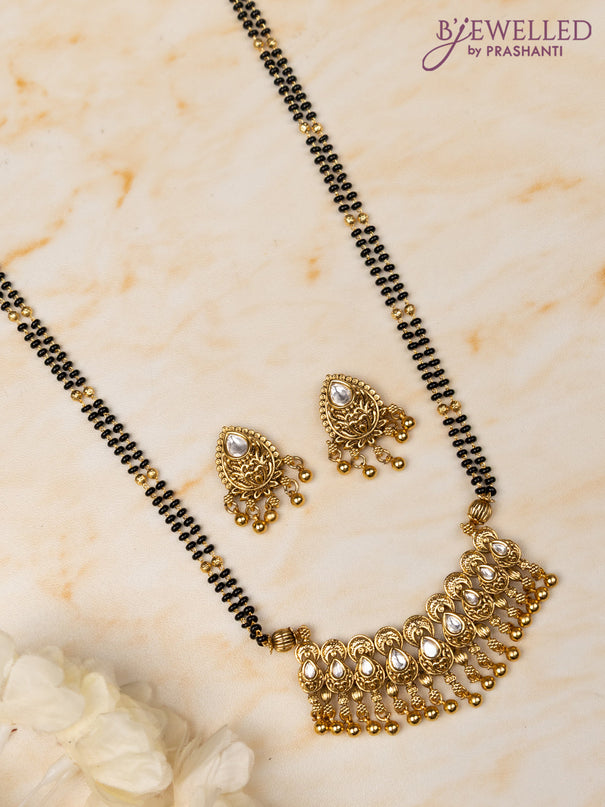 Mangalsutra double layer with kundan stones and golden beads hangings