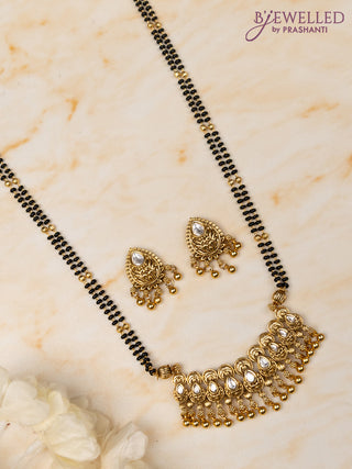 Mangalsutra double layer with kundan stones and golden beads hangings