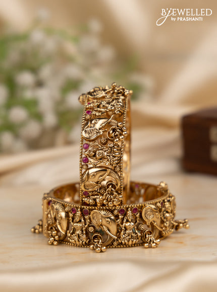 Antique screw type bangles lakshmi & elephant design with ruby stones and golden beads hangings
