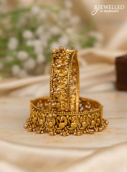 Antique screw type bangles peacock design with golden beads hangings