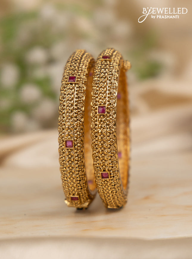 Antique screw type bangles with ruby stones
