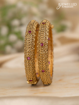 Antique screw type bangles with ruby stones