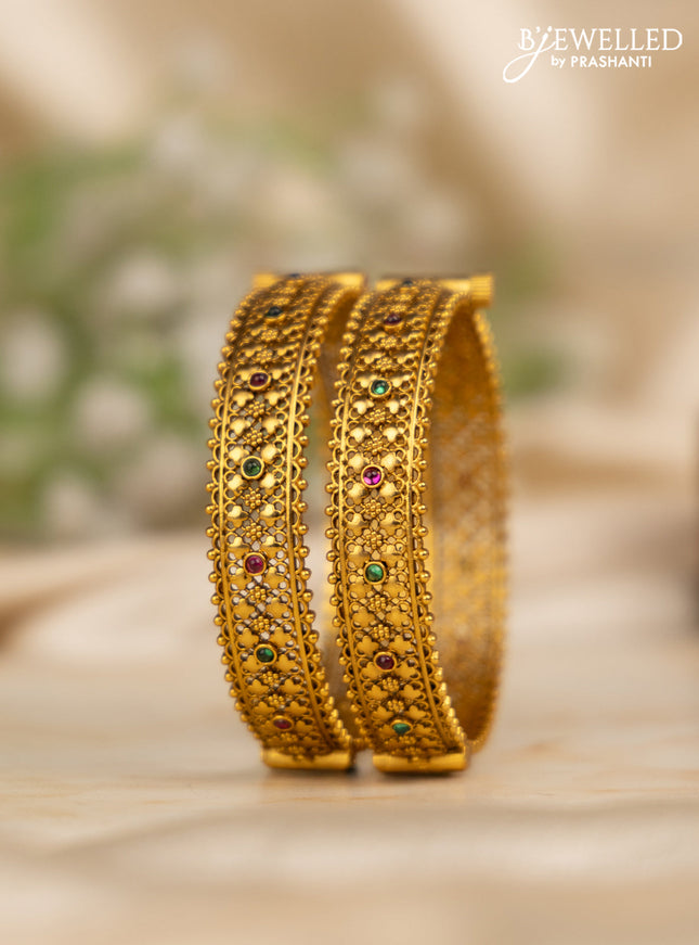 Antique screw type bangles with kemp stones