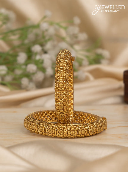 Antique screw type bangles with floral design