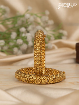 Antique screw type bangles with floral design