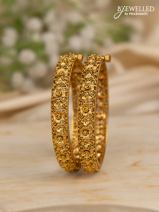 Antique screw type bangles with floral design