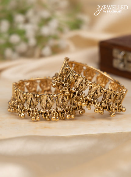 Antique screw type bangles with radha krishna design and golden beads hangings