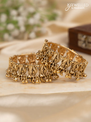 Antique screw type bangles with radha krishna design and golden beads hangings