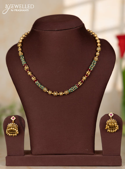 Beaded necklace with round gold balls with matching jhumka