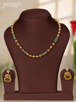Beaded necklace with round gold balls with matching jhumka