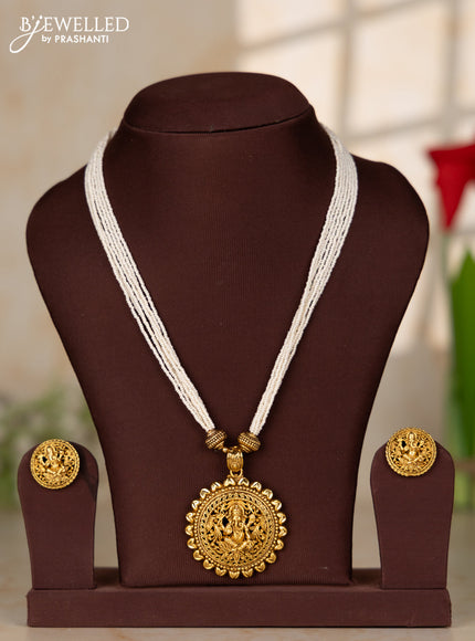 Beaded white multilayer necklace with antique ganesha pendant