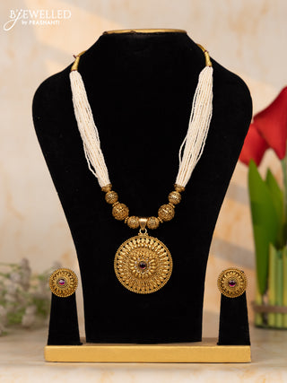 Beaded white multilayer necklace with antique floral pendant in red & white kemp stones