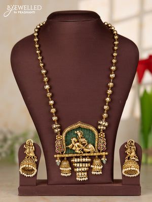 Beaded haaram with gold beads with radhe kridhna pendant and jhumka hanging
