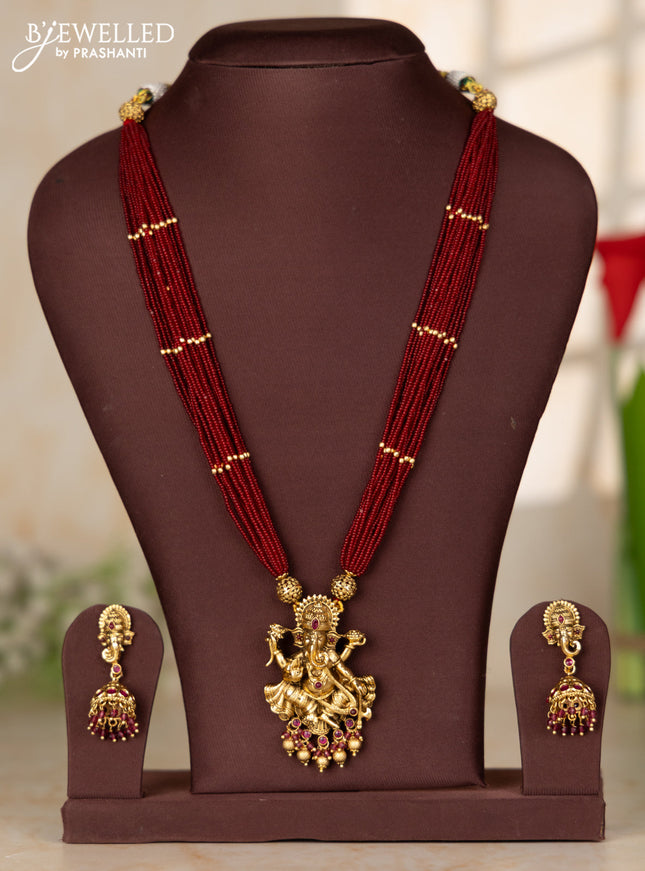 Beaded red multilayer haaram with ganesha pendant in kemp stones and golden ball hanging