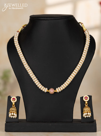 Pearl necklace with antique small round beads embedded in between the pearls