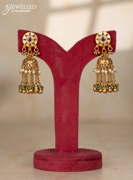 Beaded white multilayer necklace with antique jhumka pendant in red color kemp stones
