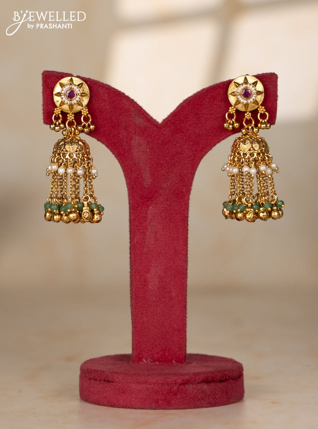 Beaded white multilayer necklace with antique jhumka pendant in red color kemp stones