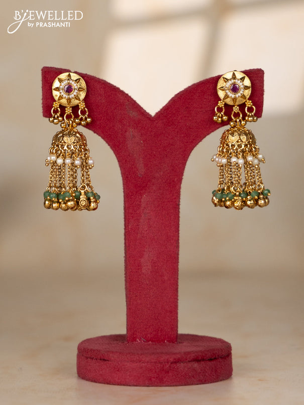 Beaded white multilayer necklace with antique jhumka pendant in red color kemp stones