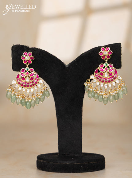 Ring type choker with floral pendant in jadau kundan stones and mint green beads hanging