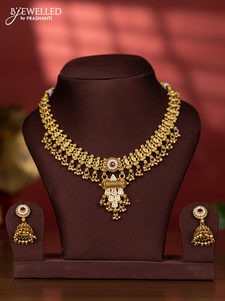 Antique necklace with geometric design & kemp stones and golden beads hanging