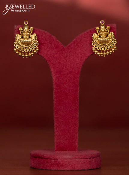 Ring type choker with lakshmi pendant in red kemp stones and golden beads hanging
