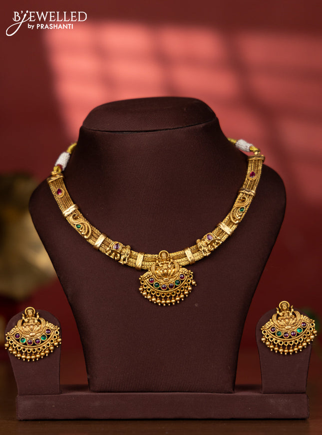 Ring type choker with lakshmi pendant in multicolor kemp stones and golden beads hanging