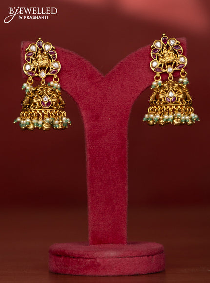 Antique necklace with double peacock and raja rani deisgn in kemp and white stones and pearl beads hanging